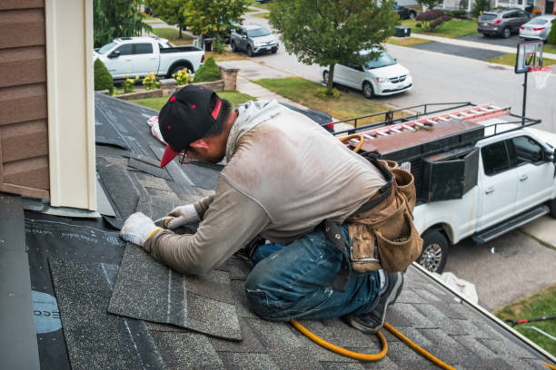 Professional Gutter Repair And Installation technician working in Irvington, NY